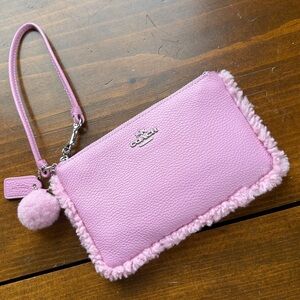 Coach 64765B Pink Shearling Pom Pom Leather Wristlet